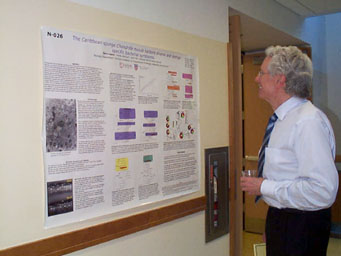 Professor Jack Beal reads about sponge-bacteria symbionts