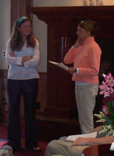 Dr. Diane Brousseau awards her student, Anna Murphy for her research in marine biology.  