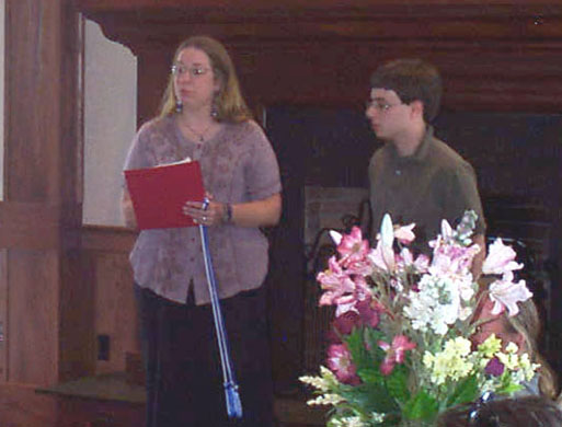 Dr. Linda Henkel awards student Michael Pirrotta with his Sigma Xi certificate and graduation cord.